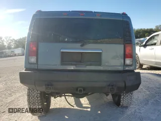 2005 Hummer H2 SUV with VIN 5GRGN23U25H115698, listed as a Copart auction lot 82569874 with 143,367 mi miles and Salvage Title. Bid and sale history available at carsss.com. Image 6.