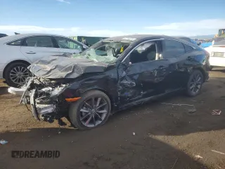 2020 Honda Civic Sedan EX with VIN 19XFC1F39LE011390, listed as a Copart auction lot 43744235 with 34,460 mi miles and Salvage Title. Bid and sale history available at carsss.com. Image 1.