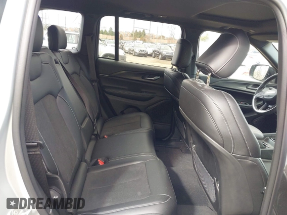 2023 Jeep Grand Cherokee Laredo with VIN 1C4RJHAG2PC660418, listed as a IAAI auction lot 41693879 with 4,295 mi miles and . Bid and sale history available at DreamBid. Image 8.