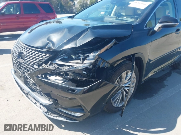 2020 Lexus RX with VIN 2T2JGMDA0LC048405, listed as a IAAI auction lot 41755505 with 62,542 mi miles. Bid and sale history available at carsss.com. Image 6.