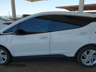 2023 Chevrolet Bolt EV 1LT z VIN 1G1FW6S0XP4112907, wystawiony jako IAAI lot #42250871 z przebiegiem 25 219 mil mil oraz . Historia ofert i sprzedaży dostępna na DreamBid. Obrazek 14.