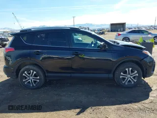 2017 Toyota RAV4 LE with VIN 2T3BFREV2HW543163, listed as a IAAI auction lot 41875755 with 96,398 mi miles and . Bid and sale history available at carsss.com. Image 13.