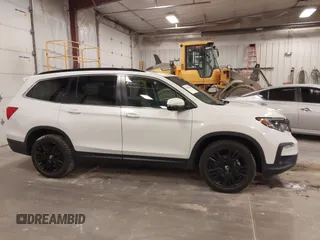 2021 Honda Pilot Special Edition with VIN 5FNYF6H2XMB054312, listed as a IAAI auction lot 41828508 with 115,652 mi miles and . Bid and sale history available at DreamBid. Image 13.