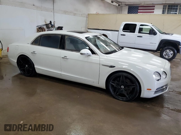 2015 Bentley Flying Spur with VIN SCBEC9ZA4FC041190, listed as a Copart auction lot 71217924 with 73,449 mi miles and Clean title. Bid and sale history available at DreamBid. Image 4.