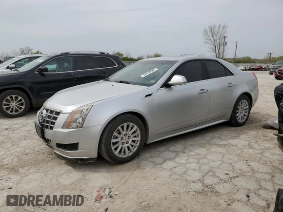 2013 Cadillac CTS Luxury with VIN 1G6DH5E58D0175326, listed as a Copart auction lot 52646985 with 142,473 mi miles and Salvage title. Bid and sale history available at DreamBid. Image 1.