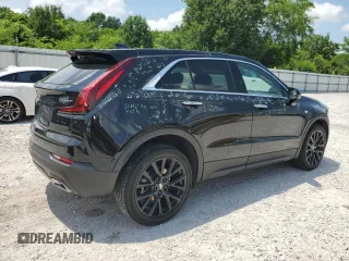 2023 Cadillac XT4 FWD Luxury с VIN 1GYAZAR47PF107473, выставлен на аукционе Copart как лот 59137665 с пробегом 9 198 миль миль и Списание • Salvage title. История ставок и продаж доступна на DreamBid. Изображение 3.