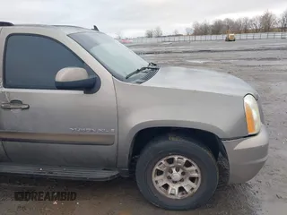 2007 GMC Yukon XL SLT with VIN 1GKFK16327J266852, listed as a IAAI auction lot 41198942 with 243,905 mi miles. Bid and sale history available at carsss.com. Image 13.