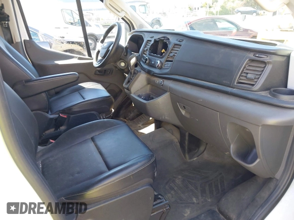 2021 Ford Transit Cargo with VIN 1FTBR2Y80MKA35393, listed as a IAAI auction lot 41732236 with 24,799 mi miles and . Bid and sale history available at DreamBid. Image 5.