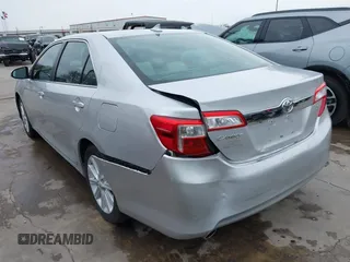 2014 Toyota Camry SE with VIN 4T1BK1FK7EU540975, listed as a IAAI auction lot 41673926 with 190,036 mi miles. Bid and sale history available at carsss.com. Image 3.