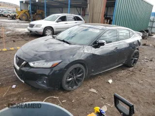 2019 Nissan Maxima Platinum z VIN 1N4AA6AVXKC367297, wystawiony jako Copart lot #42646375 z przebiegiem 57 140 mil mil oraz Szkody całkowita. Historia ofert i sprzedaży dostępna na DreamBid. Obrazek 1.