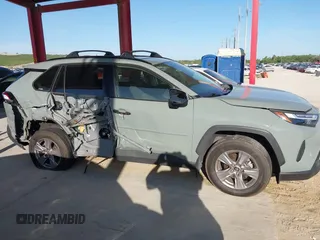 2022 Toyota RAV4 Hybrid XLE with VIN JTMRWRFV9NJ054668, listed as a IAAI auction lot 42606261 with 61,794 mi miles and . Bid and sale history available at DreamBid. Image 13.