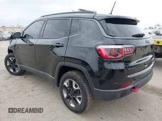 2018 Jeep Compass Trailhawk with VIN 3C4NJDDB3JT451658, listed as a IAAI auction lot 42087588 with 90,189 mi miles and . Bid and sale history available at DreamBid. Image 3.
