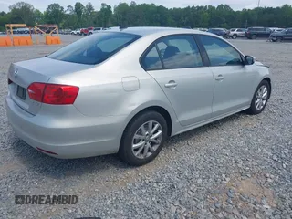 2011 Volkswagen Jetta Sedan SE w/Convenience & Sunroof PZEV with VIN 3VWDZ7AJ9BM360775, listed as a IAAI auction lot 42134100 with 183,012 mi miles. Bid and sale history available at carsss.com. Image 4.