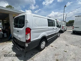 2015 Ford Transit Cargo with VIN 1FTNR1ZM6FKA47229, listed as a Copart auction lot 64808455 with 227,682 mi miles and Clean title. Bid and sale history available at DreamBid. Image 4.