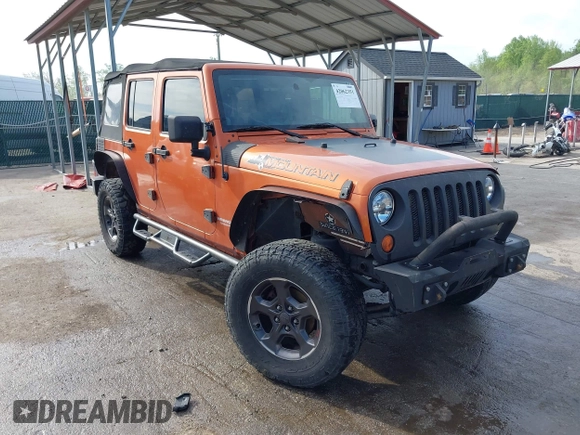 2010 Jeep Wrangler Unlimited Sport with VIN 1J4HA3H1XAL189667, listed as a IAAI auction lot 42062351 with 144,838 mi miles. Bid and sale history available at carsss.com. Image 1.