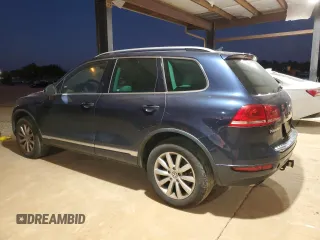 2012 Volkswagen Touareg Exec with VIN WVGEF9BP8CD007760, listed as a Copart auction lot 79271654 with 164,287 mi miles and Clean Title. Bid and sale history available at DreamBid. Image 2.