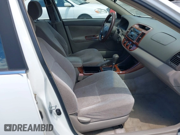 2004 Toyota Camry LE with VIN JTDBE32KX40279599, listed as a IAAI auction lot 42202160 with 288,879 mi miles and . Bid and sale history available at carsss.com. Image 5.