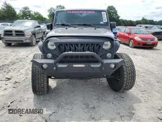 2017 Jeep Wrangler Unlimited Rubicon Recon with VIN 1C4HJWFG3HL510439, listed as a Copart auction lot 60791165 with 125,955 mi miles and Salvage title. Bid and sale history available at DreamBid. Image 5.