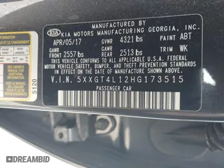 2017 Kia Optima LX 1.6T with VIN 5XXGT4L12HG173515, listed as a IAAI auction lot 42040458 with 103,595 mi miles. Bid and sale history available at carsss.com. Image 9.