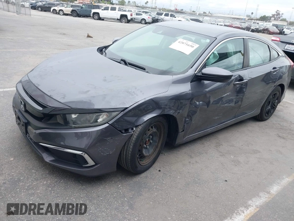 2020 Honda Civic LX with VIN 2HGFC2F63LH530442, listed as a IAAI auction lot 42071650 with 38,520 mi miles and . Bid and sale history available at DreamBid. Image 2.