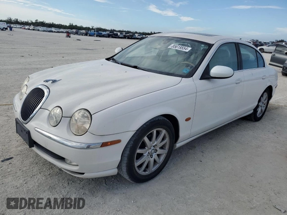 2003 Jaguar S-Type z VIN SAJEA01UX3HM59287, wystawiony jako Copart lot #85619554 z przebiegiem 182 851 mil mil oraz Tytuł czysty. Historia ofert i sprzedaży dostępna na DreamBid. Obrazek 1.