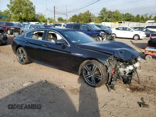2013 BMW 6 Series 650i xDrive with VIN WBA6B4C57DDG67584, listed as a Copart auction lot 70319464 with 0 mi miles and Salvage Title. Bid and sale history available at carsss.com. Image 4.