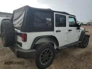 2012 Jeep Wrangler Unlimited Sport z VIN 1C4BJWDG9CL169159, wystawiony jako Copart lot #83647894 z przebiegiem 120 684 mil mil oraz Szkoda całkowita • Salvage title. Historia ofert i sprzedaży dostępna na DreamBid. Obrazek 3.