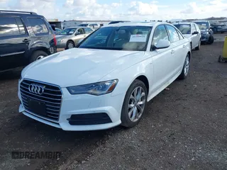 2018 Audi A6 Premium with VIN WAUC8AFC0JN097103, listed as a IAAI auction lot 41399918 with 115,014 mi miles. Bid and sale history available at carsss.com. Image 2.