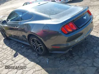 2016 Ford Mustang EcoBoost z VIN 1FA6P8TH7G5259089, wystawiony jako IAAI lot #42048289 z przebiegiem 108 752 mil mil oraz . Historia ofert i sprzedaży dostępna na DreamBid. Obrazek 3.