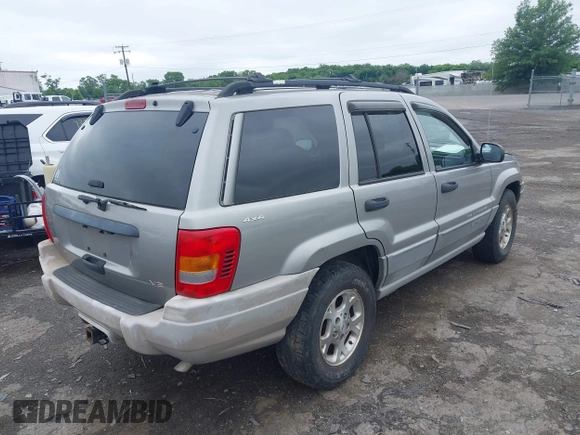 2000 Jeep Grand Cherokee Laredo with VIN 1J4GW48N9YC191779, listed as a IAAI auction lot 42378307 with 224,836 mi miles and . Bid and sale history available at DreamBid. Image 4.
