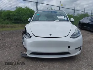 2022 Tesla Model Y Long Range with VIN 7SAYGDEE3NF380067, listed as a IAAI auction lot 41016704 with 52,180 mi miles and . Bid and sale history available at DreamBid. Image 21.