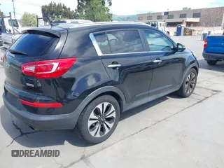 2011 Kia Sportage SX with VIN KNDPC3A69B7149771, listed as a IAAI auction lot 42012102 with 125,157 mi miles and . Bid and sale history available at carsss.com. Image 4.