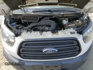 2018 Ford Transit z VIN 1FTYR1ZM0JKA09453, wystawiony jako Copart lot #55241035 z przebiegiem 227 932 mil mil oraz Szkoda całkowita • Salvage title. Historia ofert i sprzedaży dostępna na DreamBid. Obrazek 11.