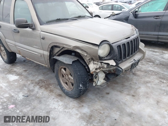 2004 Jeep Liberty Limited z VIN 1J4GL58K74W249983, wystawiony jako IAAI lot #41546908 z przebiegiem 138 075 mil mil oraz . Historia ofert i sprzedaży dostępna na DreamBid. Obrazek 13.