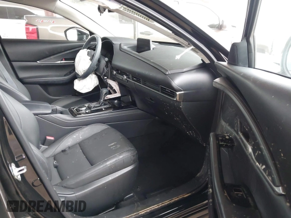 2025 Mazda CX-30 S Select Sport with VIN 3MVDMBBM3SM773819, listed as a IAAI auction lot 41584030 with 5,088 mi miles and . Bid and sale history available at DreamBid. Image 5.