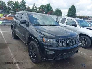 2017 Jeep Grand Cherokee Altitude with VIN 1C4RJEAG4HC702765, listed as a IAAI auction lot 42827757 with 147,996 mi miles and . Bid and sale history available at DreamBid. Image 1.