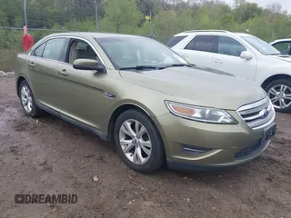 2012 Ford Taurus SEL z VIN 1FAHP2EW0CG105632, wystawiony jako IAAI lot #42184733 z przebiegiem 196 670 mil mil oraz . Historia ofert i sprzedaży dostępna na DreamBid. Obrazek 1.