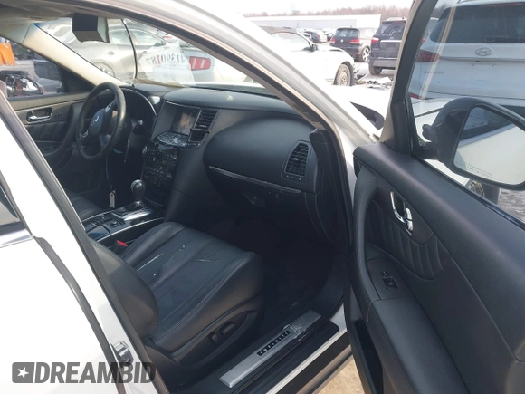 2015 Infiniti QX70 with VIN JN8CS1MW4FM481257, listed as a IAAI auction lot 41390187 with 127,892 mi miles and . Bid and sale history available at DreamBid. Image 5.