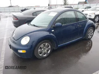 2003 Volkswagen New Beetle Coupe GL with VIN 3VWBK21C03M405877, listed as a IAAI auction lot 41851419 with 226,116 mi miles. Bid and sale history available at carsss.com. Image 2.