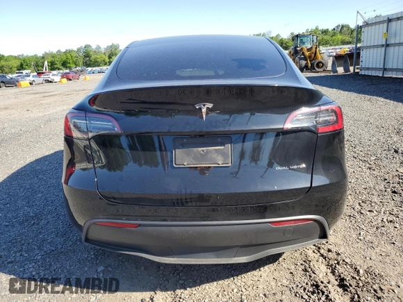 2023 Tesla Model Y Long Range z VIN 7SAYGDEE1PF865195, wystawiony jako Copart lot #57455765 z przebiegiem 32 011 mil mil oraz Szkoda całkowita • Salvage title. Historia ofert i sprzedaży dostępna na DreamBid. Obrazek 6.