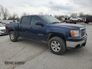 2012 GMC Sierra 1500 SLE with VIN 3GTP2VE70CG257543, listed as a Copart auction lot 51499435 with 195,636 mi miles and Salvage title. Bid and sale history available at DreamBid. Image 4.