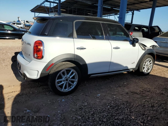 2015 MINI Countryman S with VIN WMWZC5C53FWP44388, listed as a Copart auction lot 54560585 with 67,913 mi miles and Salvage Title. Bid and sale history available at DreamBid. Image 3.