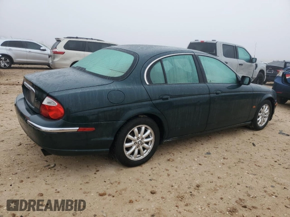 2002 Jaguar S-Type with VIN SAJDA01P12GM27242, listed as a Copart auction lot 88579215 with 218,546 mi miles and Salvage Title. Bid and sale history available at DreamBid. Image 3.