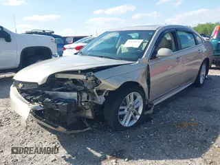 2012 Chevrolet Impala LTZ with VIN 2G1WC5E37C1180838, listed as a IAAI auction lot 41976474 with 107,397 mi miles and . Bid and sale history available at DreamBid. Image 17.