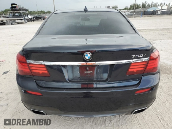 2013 BMW 7 Series 750i with VIN WBAYA8C56DC996704, listed as a Copart auction lot 64466705 with 102,278 mi miles and Salvage title. Bid and sale history available at DreamBid. Image 6.