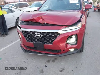 2019 Hyundai Santa Fe Ultimate with VIN 5NMS5CAA4KH105145, listed as a IAAI auction lot 41156214 with 54,796 mi miles and . Bid and sale history available at DreamBid. Image 6.