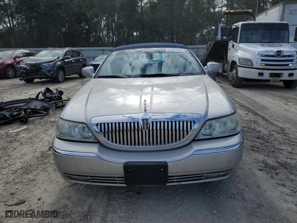 2003 Lincoln Town Car Cartier with VIN 1LNHM83W23Y639990, listed as a Copart auction lot 85591924 with 124,515 mi miles and Salvage Title. Bid and sale history available at carsss.com. Image 5.