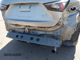 2016 Scion iA z VIN 3MYDLBZV1GY132561, wystawiony jako IAAI lot #42425947 z przebiegiem 94 882 mil mil oraz . Historia ofert i sprzedaży dostępna na DreamBid. Obrazek 18.