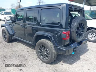 2021 Jeep Wrangler Unlimited Sahara z VIN 1C4JJXP63MW767719, wystawiony jako IAAI lot #41906155 z przebiegiem 44 689 mil mil oraz . Historia ofert i sprzedaży dostępna na DreamBid. Obrazek 3.