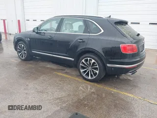 2019 Bentley Bentayga V8 z VIN SJAAM2ZVXKC025218, wystawiony jako IAAI lot #41741586 z przebiegiem 52 457 mil mil oraz . Historia ofert i sprzedaży dostępna na DreamBid. Obrazek 3.